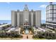 Stunning high-rise condo building with beautifully landscaped entrance, fountain, and ample parking at 5310 N Ocean Blvd. # Ph 6 1506, Myrtle Beach, SC 29577