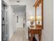 Entry hallway with tile floors, decorative table and mirror at 5310 N Ocean Blvd. # Ph 6 1506, Myrtle Beach, SC 29577