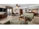 Spacious living area with comfortable seating, balcony access and connecting kitchen at 5310 N Ocean Blvd. # Ph 6 1506, Myrtle Beach, SC 29577