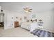Comfortable bedroom featuring neutral carpet, ceiling fan, and natural light at 560 Pier Ct., Longs, SC 29568