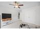 Home gym featuring workout equipment, ceiling fan, and flat-screen TV at 560 Pier Ct., Longs, SC 29568