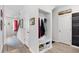 Bright foyer with coat rack, decor, and view of staircase and entry, welcoming ambiance at 560 Pier Ct., Longs, SC 29568