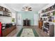 Cozy office with ample shelving, a large window, and stylish decor, ideal for a home workspace at 560 Pier Ct., Longs, SC 29568