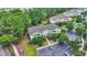 Aerial view of a multi-Gathering home with ample parking and mature trees at 5825 Catalina Dr. # 523, North Myrtle Beach, SC 29582