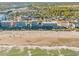 Beautiful aerial view of beachside condos, sandy beach, and ocean waves at 5825 Catalina Dr. # 523, North Myrtle Beach, SC 29582