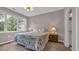 Bright bedroom features a comfortable bed, side tables, and large windows at 5825 Catalina Dr. # 523, North Myrtle Beach, SC 29582