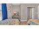Cozy bedroom with two beds, a gray dresser, decorative oars, and a television on the dresser at 5825 Catalina Dr. # 523, North Myrtle Beach, SC 29582