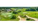 Breathtaking aerial view of the golf course, clubhouse, and surrounding landscape at 5825 Catalina Dr. # 523, North Myrtle Beach, SC 29582