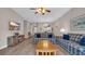 Inviting living room showcasing comfortable seating, a TV, and open access to the dining area at 5825 Catalina Dr. # 523, North Myrtle Beach, SC 29582