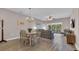 Open-concept living and dining area with wood-look flooring and natural light at 5825 Catalina Dr. # 523, North Myrtle Beach, SC 29582