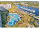 Scenic aerial view of pool area, lush landscaping, harbor, and Intracoastal Waterway at 5825 Catalina Dr. # 523, North Myrtle Beach, SC 29582