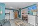 Open-concept condo living area connects living and dining spaces at 5905 S Kings Highway # 1106, Myrtle Beach, SC 29575