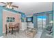 Comfortable condo living and dining area with balcony access and lots of light at 5905 S Kings Highway # 1106, Myrtle Beach, SC 29575