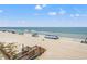 View of a sandy beach with stairs to the shore from the property at 618 N Waccamaw Dr. # A-5, Murrells Inlet, SC 29576