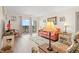 Comfortable living room featuring cozy seating and balcony access at 618 N Waccamaw Dr. # A-5, Murrells Inlet, SC 29576