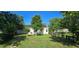 Spacious backyard with a well-maintained lawn, fenced perimeter, and mature trees for added privacy at 618 Wintercreeper Dr., Longs, SC 29568