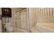 Elegant bathroom featuring a glass-enclosed shower and toilet against a wallpapered backdrop at 618 Wintercreeper Dr., Longs, SC 29568