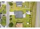Aerial view of the property showing the backyard, driveway, and surrounding neighborhood at 620 Seth Ln., Longs, SC 29568