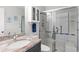 Bathroom featuring a glass door shower, granite countertops, and neutral-colored walls at 620 Seth Ln., Longs, SC 29568