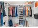 Organized walk-in closet with shelves and racks filled with clothing and shoes at 620 Seth Ln., Longs, SC 29568