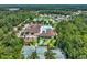 Aerial view showcasing pool, tennis courts, and shuffleboard in community at 628 Grand Cypress Way, Murrells Inlet, SC 29576