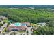 Aerial view of community amenities with pool, tennis, and walking paths at 628 Grand Cypress Way, Murrells Inlet, SC 29576