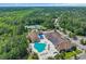 Aerial of a community pool, tennis courts, and well-maintained landscaping at 628 Grand Cypress Way, Murrells Inlet, SC 29576