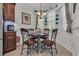 Cozy dining area with seating for four and stylish decor elements at 628 Grand Cypress Way, Murrells Inlet, SC 29576