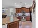 Spacious kitchen with granite countertops, stainless appliances, and modern fixtures at 628 Grand Cypress Way, Murrells Inlet, SC 29576