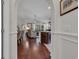Open-concept living space featuring hardwood floors and neutral decor at 628 Grand Cypress Way, Murrells Inlet, SC 29576
