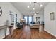 Open living room with hardwood floors and view to the dining room at 6309 Sweetwater Blvd., Murrells Inlet, SC 29576