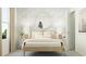 Serene bedroom with patterned wallpaper, modern furnishings, and ample natural light at 6332 Swainson Street Sw, Ocean Isle Beach, NC 28469