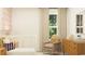 Cozy Bedroom with a rocking chair, neutral tones, and natural light at 6347 Swainson Street Sw, Ocean Isle Beach, NC 28469