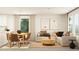Modern living space with contemporary furniture, neutral color palette, and lots of natural light at 6366 Swainson Street Sw, Ocean Isle Beach, NC 28469