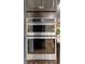 Modern kitchen featuring stainless steel appliances and dark wood cabinets at 6378 Torino Lane, Myrtle Beach, SC 29572