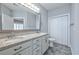 Bright bathroom featuring a double vanity, granite countertop and neutral wall color at 648 Sunnyside Dr. # 102, Murrells Inlet, SC 29576