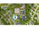 Aerial view of community amenities with pool, tennis courts, boat storage, and lush green landscape at 6681 Wisteria Dr., Myrtle Beach, SC 29588