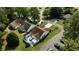 Aerial view of home with a patio and fenced yard in a neighborhood with mature trees and landscaping at 6681 Wisteria Dr., Myrtle Beach, SC 29588