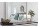 Bedroom decor reflected in the dresser mirror adds depth to the room at 6681 Wisteria Dr., Myrtle Beach, SC 29588