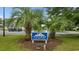 Signage and palm trees at the entrance to the Myrtle Beach Golf & Yacht Club Community Center at 6681 Wisteria Dr., Myrtle Beach, SC 29588