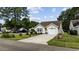 Well-kept home with tidy landscaping, a driveway, and attached garage at 6681 Wisteria Dr., Myrtle Beach, SC 29588