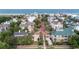An aerial view of a neighborhood showcasing beach proximity and highlighting rooftops and landscaping at 70 Beachwalker Ct., Georgetown, SC 29440