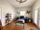 Inviting bedroom featuring hardwood floors, natural light, and coastal decor at 70 Beachwalker Ct., Georgetown, SC 29440
