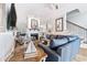 Elegant living room with a cozy fireplace, comfortable seating, and stylish decor, creating an inviting atmosphere at 70 Beachwalker Ct., Georgetown, SC 29440