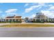 Exterior view of the community clubhouse, showcasing its attractive design and well-kept grounds at 7183 Shooting Star Way, Myrtle Beach, SC 29579