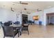 Community room features several seating areas, ceiling fans and view to the outdoor amenities at 7183 Shooting Star Way, Myrtle Beach, SC 29579