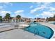 Scenic community pool featuring a bridge, swim up bar, and various water features at 7183 Shooting Star Way, Myrtle Beach, SC 29579