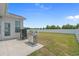 Backyard includes a concrete patio perfect for grilling, privacy fence, and a grass lawn at 753 Enchantment Loop, Myrtle Beach, SC 29588
