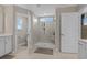 Spacious bathroom showcasing a large glass shower, double vanity, and neutral tile flooring for a luxurious feel at 753 Enchantment Loop, Myrtle Beach, SC 29588