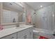 Charming bathroom featuring a vanity with modern hardware, large mirror, shower-tub combo and ample lighting at 753 Enchantment Loop, Myrtle Beach, SC 29588